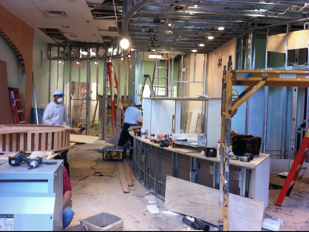 The Fresno Tuttimelon mid-buildout: framing, ladders, and an unfinished counter