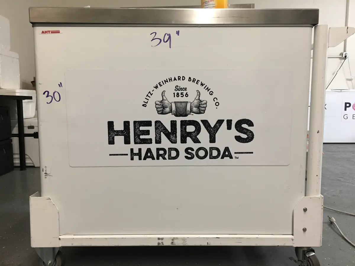A Pop Carts cart with a Henry's Hard Soda wrap