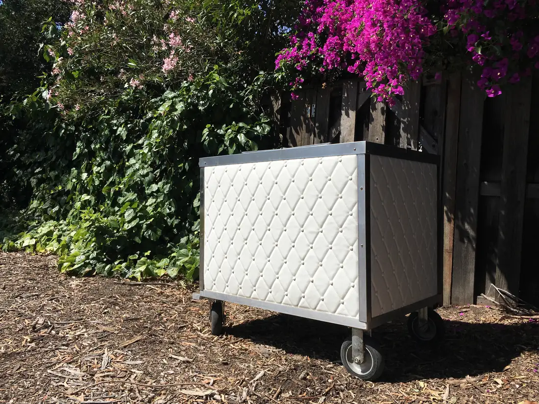 A Pop Carts cart in its plain white quilted finish, ready for a wrap