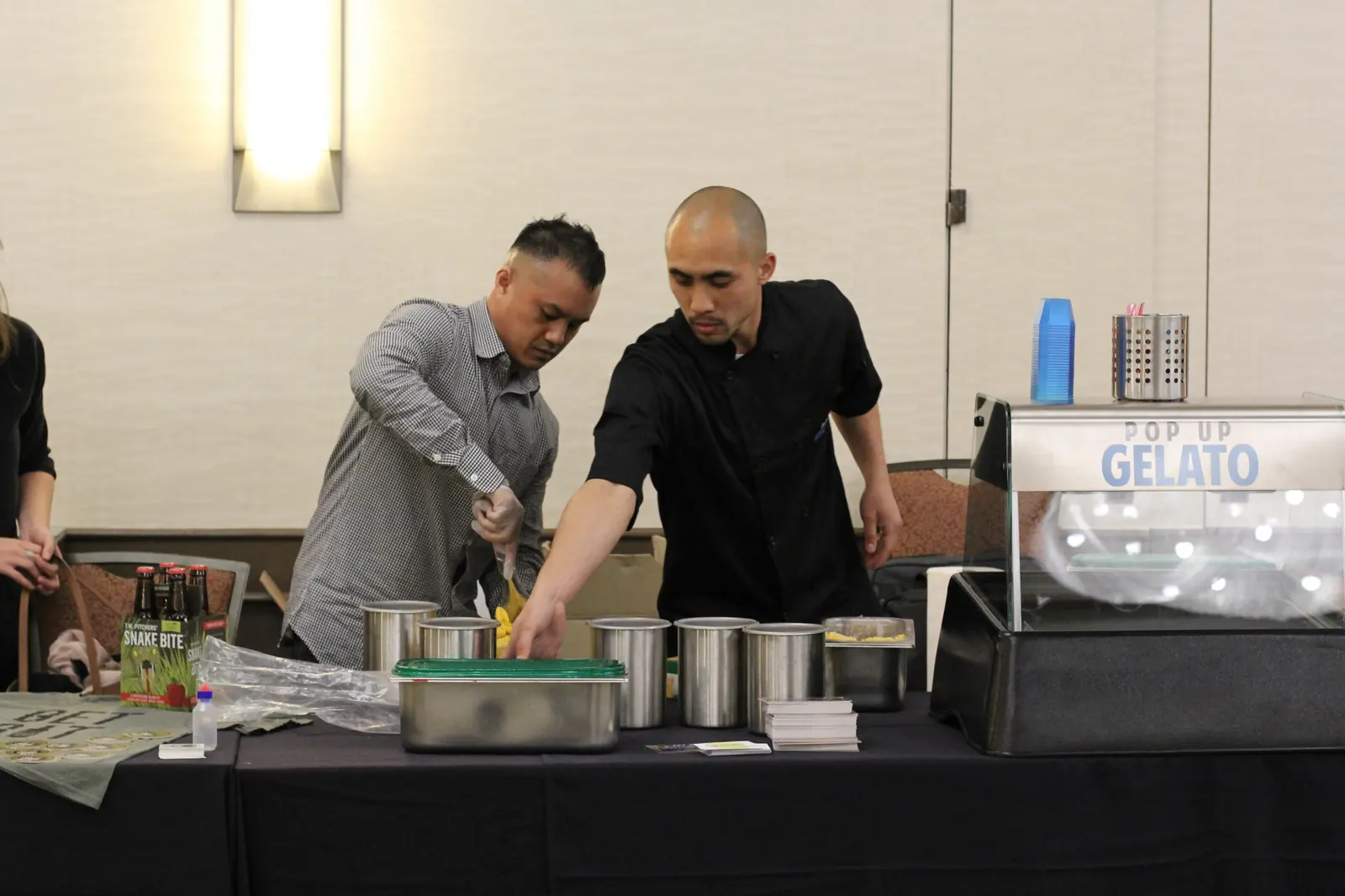 Marvin and a partner prepping gelato behind the station before a Yelp Elite event, 2014